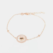 Bracciale in Argento 925  rosè con cuore su base madre perla in giro di zirconi