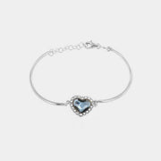 Bracciale in Argento 925 semi-rigido con cristallo forma cuore blu denim e giro di cristalli bianchi