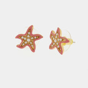 Orecchini in Metallo con stella marina rosa