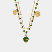 Collana in Metallo multifilo con campanella e pietre verdi