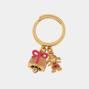 Anello in Metallo con campanella rosa e fiocco centrale con pendenti a forma di bimba