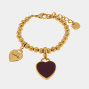 Bracciale in Metallo con cuore pendente in smalto viola e scritta Capri