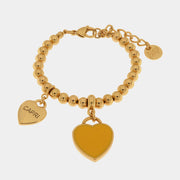 Bracciale in Metallo con cuore pendente in smalto giallo e scritta Capri