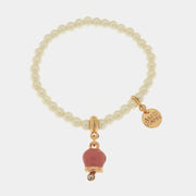 Bracciale in Metallo Bracciale in Metallo con perle e campanella portafortuna in smalto rosa