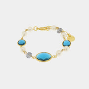 Bracciale in Metallo con cristalli azzurri ispirati al vetro di Murano e perle