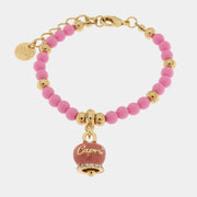 Bracciale in Metallo con campanella pendente e perline rosa