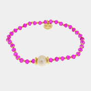 Bracciale in Metallo perla sintetica centrale e cristalli rosa